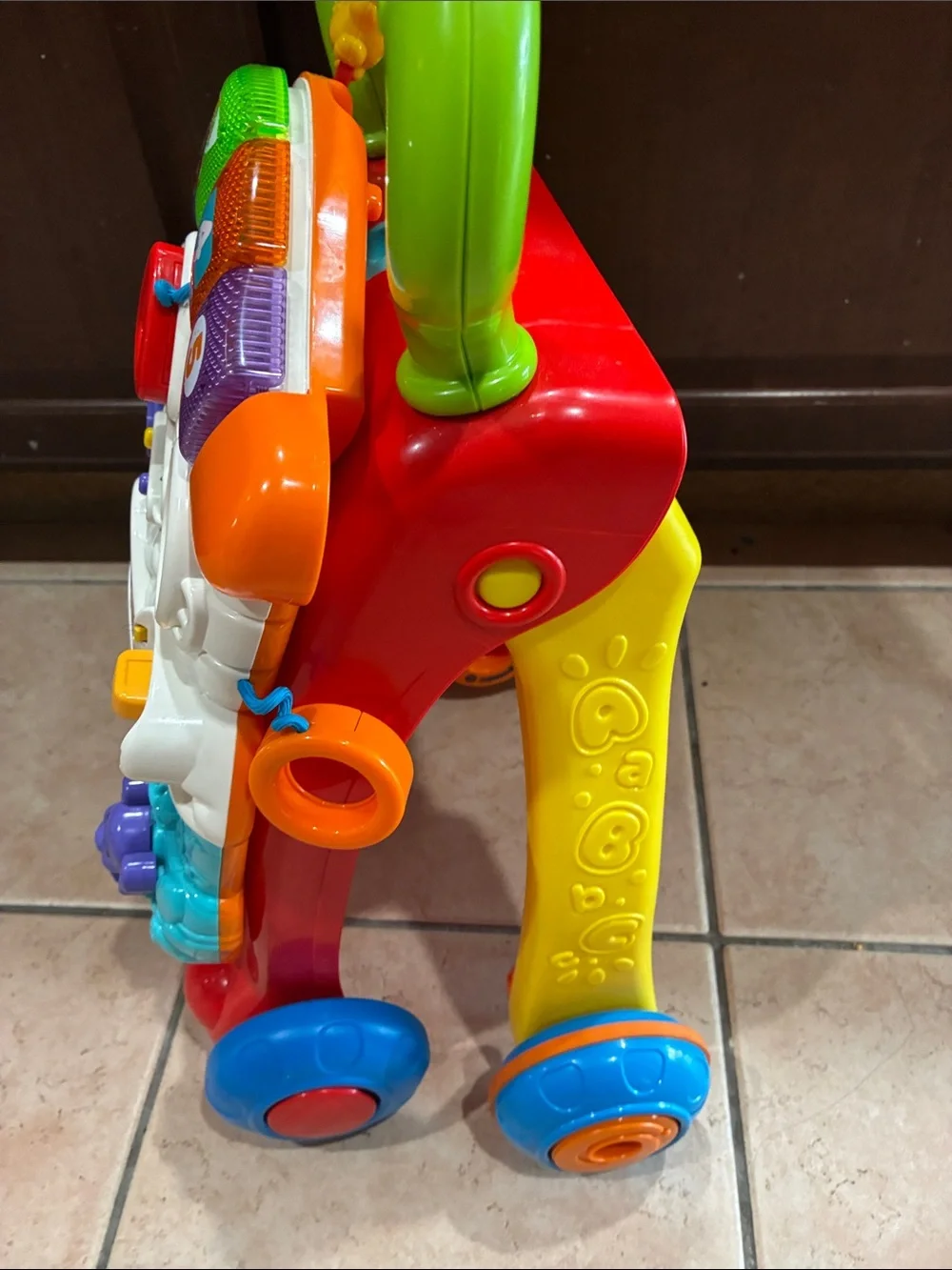 VTech Multi-Activity Learning Walker – Green Handle with Blue & Red Base